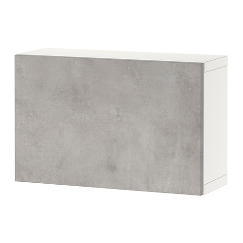 Mueble de almacenaje minimalista BESTÅ en color gris con efecto cemento.