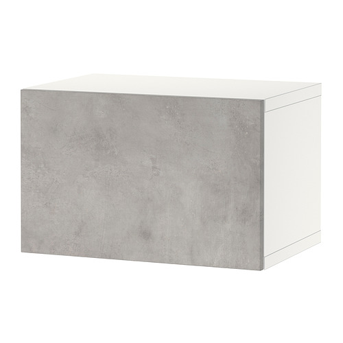 Un mueble de almacenaje BESTÅ en gris y blanco con una textura de efecto cemento y un diseño limpio y rectangular.