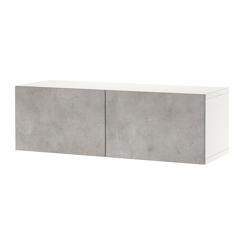 Un mueble de almacenamiento BESTÅ blanco y gris con dos puertas cerradas, de aglomerado y laminado, de forma rectangular con un diseño elegante.