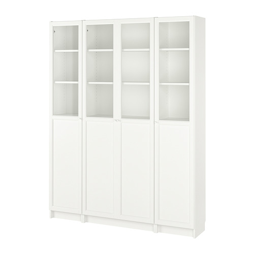 Librería BILLY blanca con puertas de cristal, diseño minimalista, bisagras ajustables.
