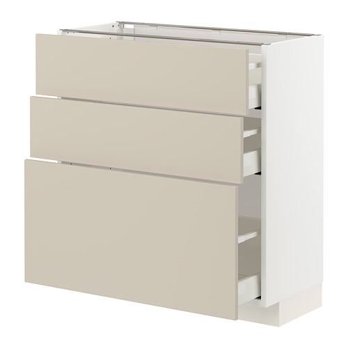 Esta imagen muestra un mueble de cocina METOD blanco con cajones havstorp beige. Tiene un diseño elegante y moderno con tres cajones y un acabado liso.