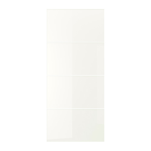 Esta imagen muestra paneles de vidrio blanco para puertas de armarios, reflejando la luz y realzando el espacio.
