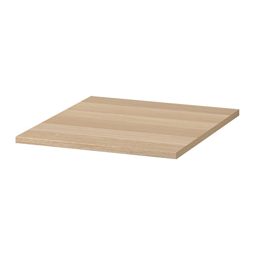 Un estante ajustable KOMPLEMENT de ikea, beige claro, rectangular, con textura de madera.