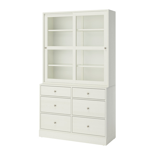 HAVSTA: mueble blanco de madera con seis cajones y puertas correderas de cristal, con un diseño rústico y elegante.