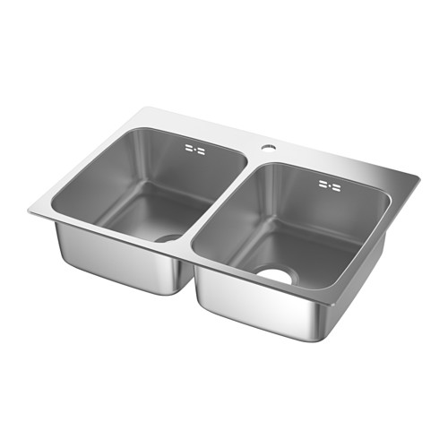 Un fregadero de cocina de doble lavabo LÅNGUDDEN de acero inoxidable. Su elegante diseño rectangular cuenta con dos compartimentos profundos para tareas eficientes de lavado y limpieza.