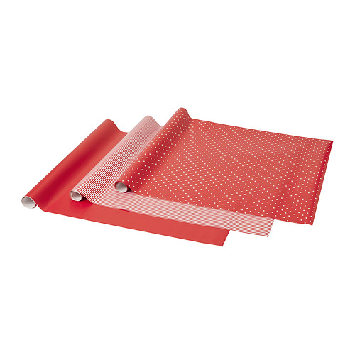 Tres rollos de papel de regalo rojo: patrones sólidos, rayados y punteados.