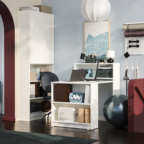 Librería BILLY blanca con mesa plegable en espacio de trabajo organizado.