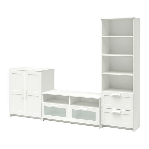 Combo de almacenamiento de TV blanco de tres piezas. Incluye armario con puertas, cajonera y librería. Diseño moderno con estantes y cajones ajustables.