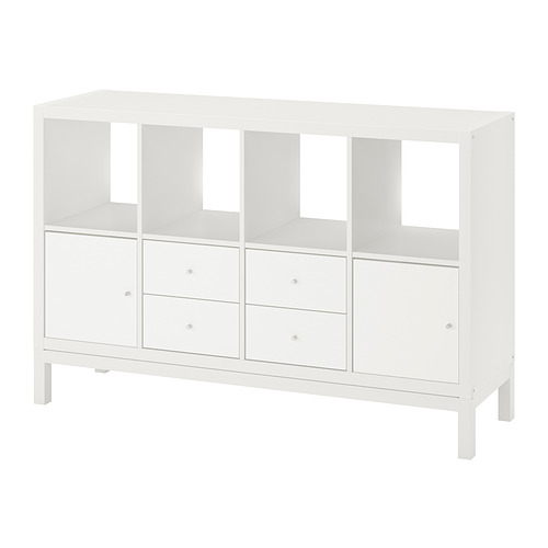 Una estantería KALLAX blanca de ikea con cajones y espacios abiertos.