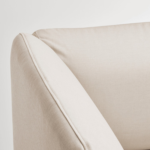 Primer plano de un sofá beige de alta calidad con tejido liso y duradero y costuras limpias.