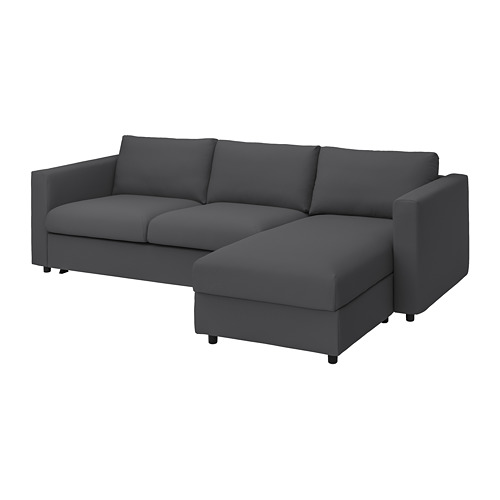 Moderno sofá cama gris en forma de L con tela suave y duradera, ideal para relajarse o dormir.