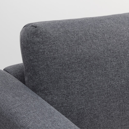 Primer plano de los sofás VIMLE oscuros, brazo y respaldo. Tejido suave y duradero con líneas limpias.