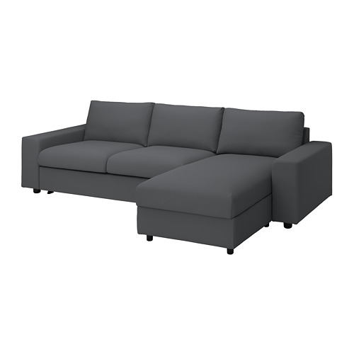 Sofá cama en forma de L gris oscuro VIMLE de líneas suaves y cojines suaves.