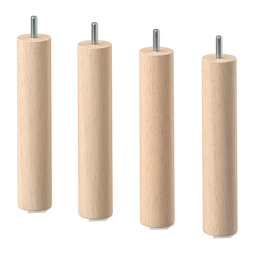 Cuatro patas de madera de color claro con extremos roscados dispuestos uno al lado del otro.