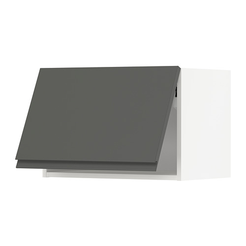 Moderno mueble de cocina gris oscuro con un diseño elegante y plano y sin tiradores visibles.