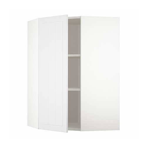 Un mueble esquinero de cocina METOD blanco con estantes ajustables y puertas reversibles.