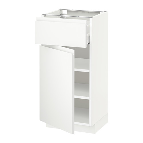 Mueble de cocina METOD blanco con cajón abierto y estante.