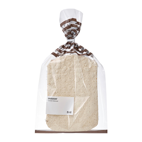 Una hogaza empaquetada de pan plano suave y fino GRÄDDAT, sellada en plástico transparente con una etiqueta.