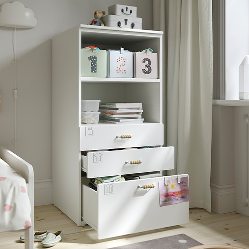 Librería SMÅSTAD con estantes y cajones abiertos, ideal para juguetes y libros de niños.