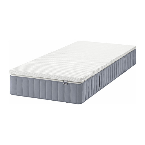 Colchón de muelles ensacados VALEVÅG de IKEA, blanco, rectangular, con laterales grises.