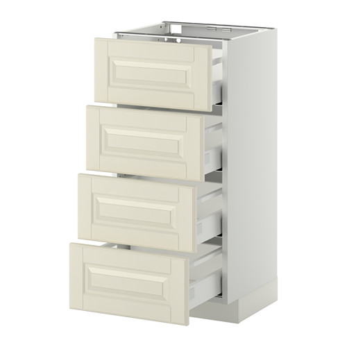 Un mueble de cocina METOD blanco con cuatro cajones blancos rotos con bordes biselados y guías lisas.
