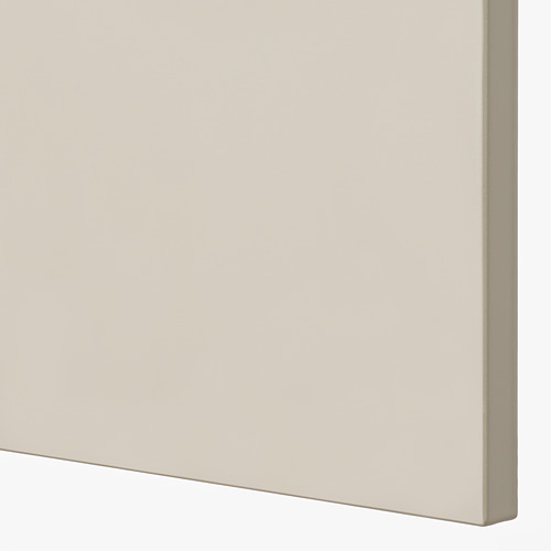 Cajón de cocina beige nítido y de líneas limpias; Superficies lisas y bien trabajadas, acabado elegante.