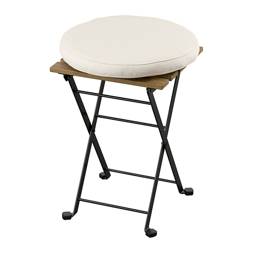 Taburete TÄRNÖ: asiento circular, patas de hierro, encimera de madera, cojín crema.