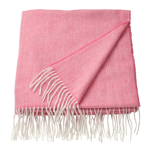Manta HOLMVI rosa brillante con flecos, poliéster suave y reciclado.