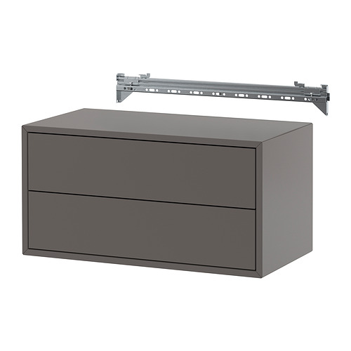 Mueble de pared gris con dos cajones y barra metálica para suspensión. Diseño sencillo y moderno de líneas limpias. Ideal para el almacenamiento.