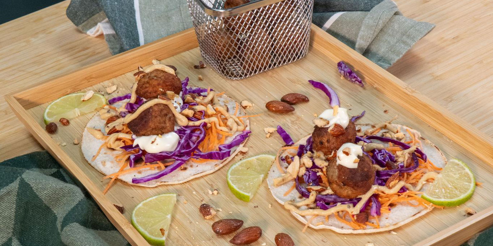 meatballs tacos with crunchy toppings & lime