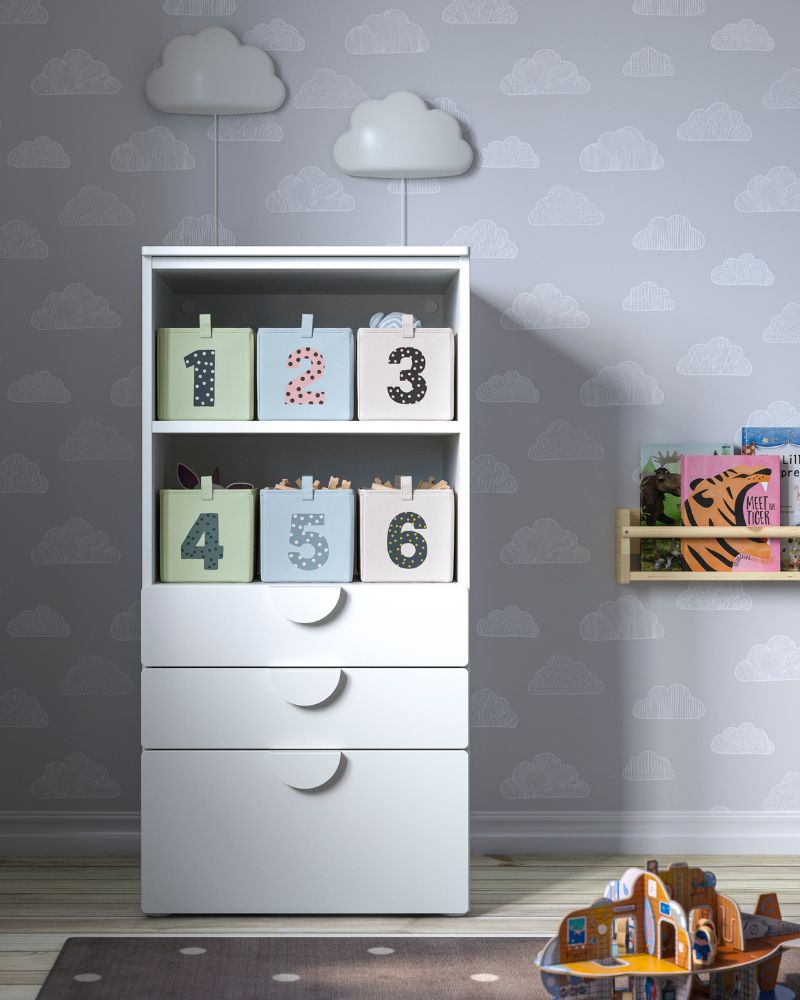 Kids’ space featuring BARNDRÖM boxes, FLISAT wall storage, LEN rug and BEGRIPA handles neatly organizing toys.
