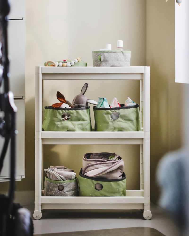 Compact VESKEN cart organized with LEN storage boxes, offering versatile space for toys, textiles and small essentials.