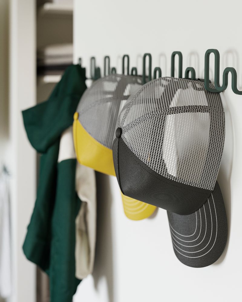 Durable JORDMÅNEN hook rail offering multiple loops for easy organization of caps and accessories.