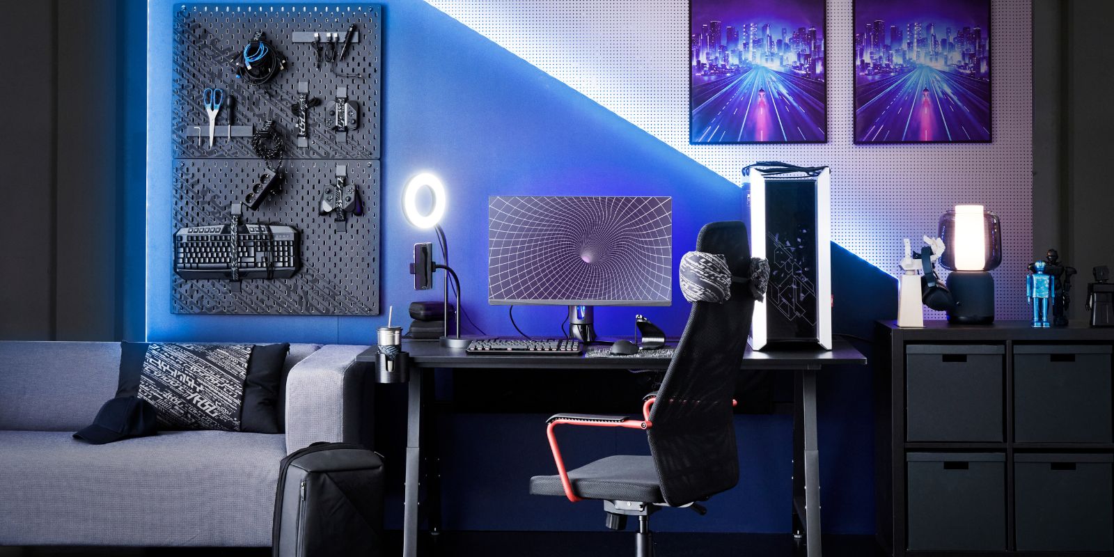 Gaming room: UPPSPEL desk, blue LEDs, MATCHSPEL Gaming chair, dual monitors.