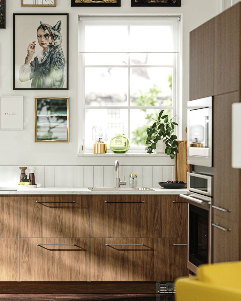 Cozy kitchen with SEKTION cabinets, BAGGANÄS handles, VRESJÖN sink and ÄLMAREN faucet under bright wall art.
