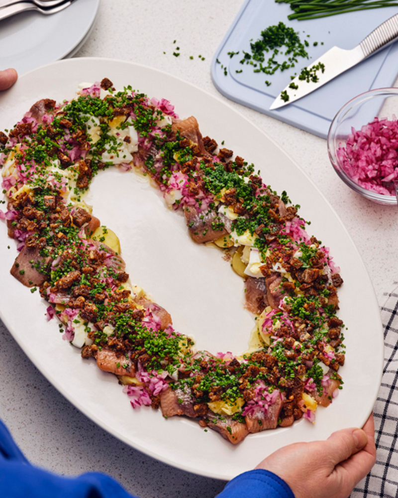 An IKEA dish made with SILL MATJES, with a RINNIG kitchen towel.