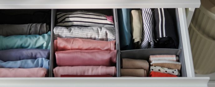 Organized drawer with STORKLINTA chest of drawers, SKUBB organizers and DAMMÄNG lidded bin.