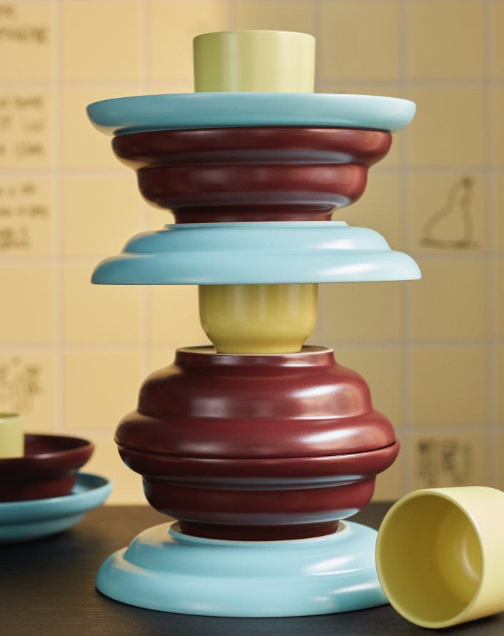 Colorful tableware stacked decoratively on a tabletop.